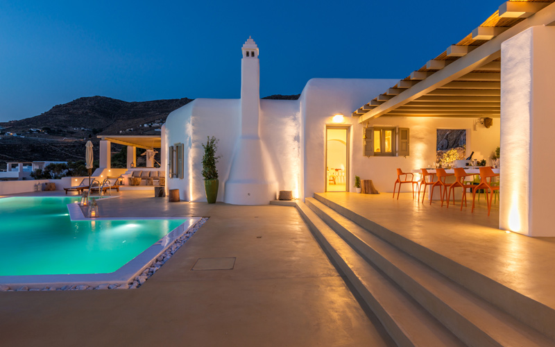 villa with pool area at night