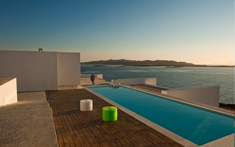 villa with pool area at sunset