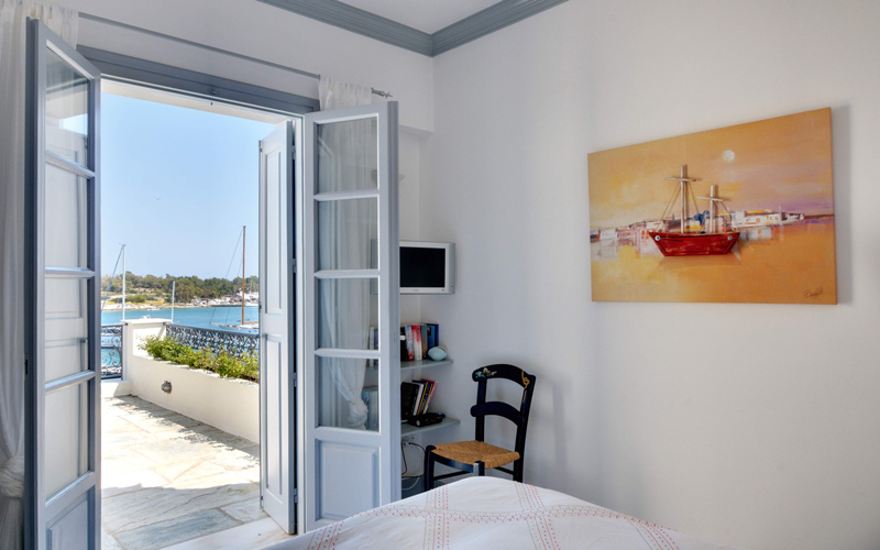double bedroom with TV