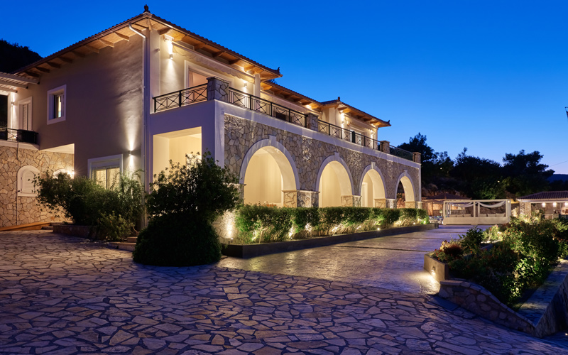 front side of a villa at night