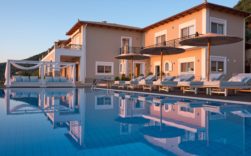 villa and pool area at sunset