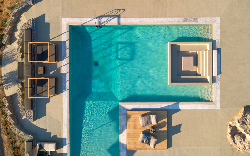 aerial of the pool with sunbeds