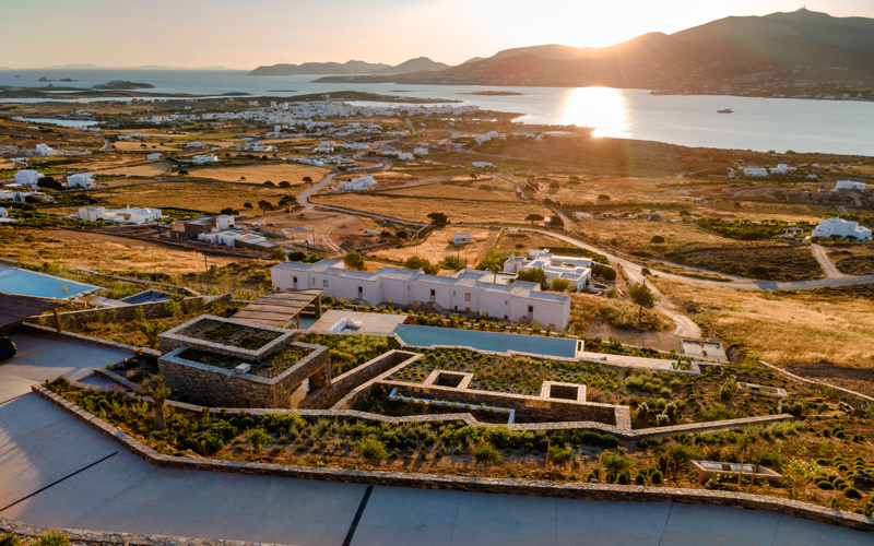 aerial photo of the villa at sunset