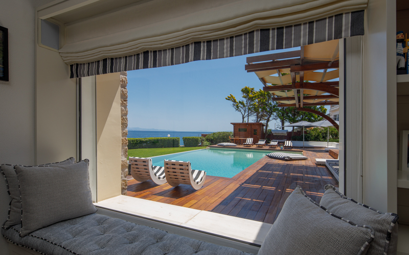 bedroom window with pool view
