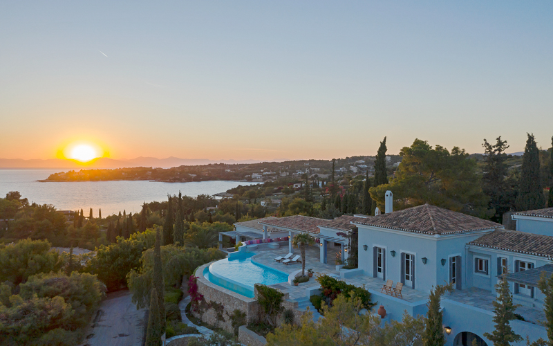 aerial photo of the villa at the sunset
