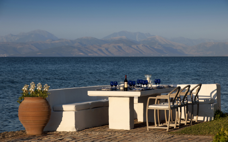 outdoor dining table above the sea
