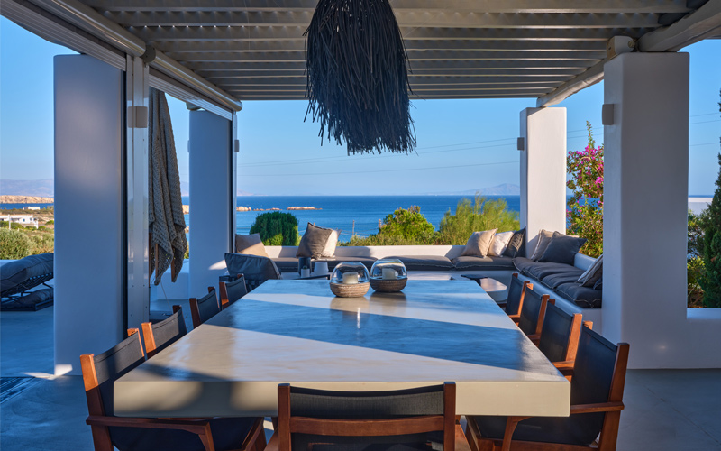 shaded dining area with sea view