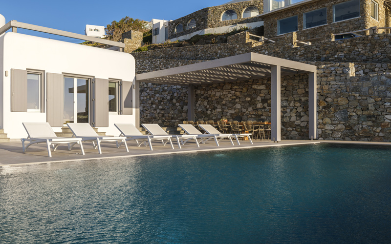 pool area with sunbeds