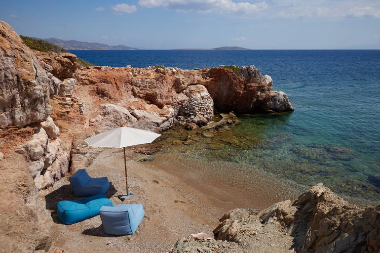 small beach in front of the house