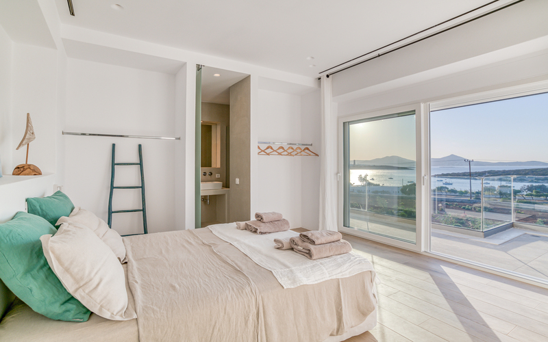 bedroom with double bed and sea view