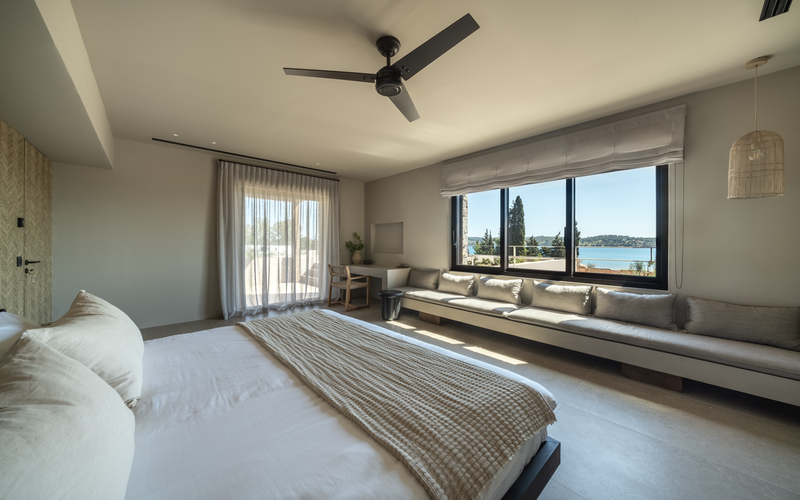 bedroom with double bed and sea view