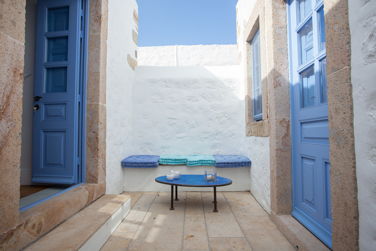 small yard with sofa and coffee table