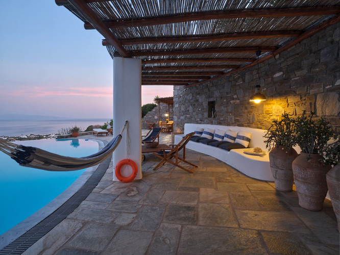 pool area with lounge area and hammock