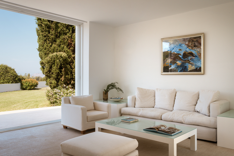 bedroom with double bed and sofa