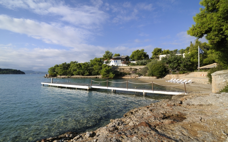 secluded beach with private dock
