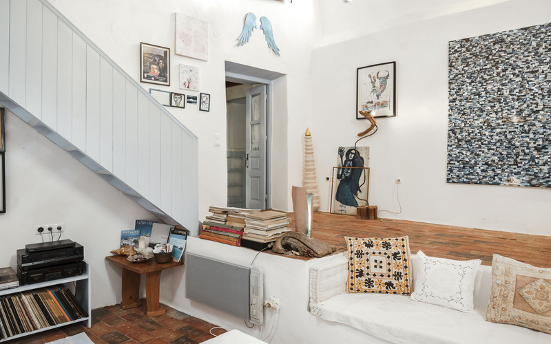 living area and stairs to upper floor