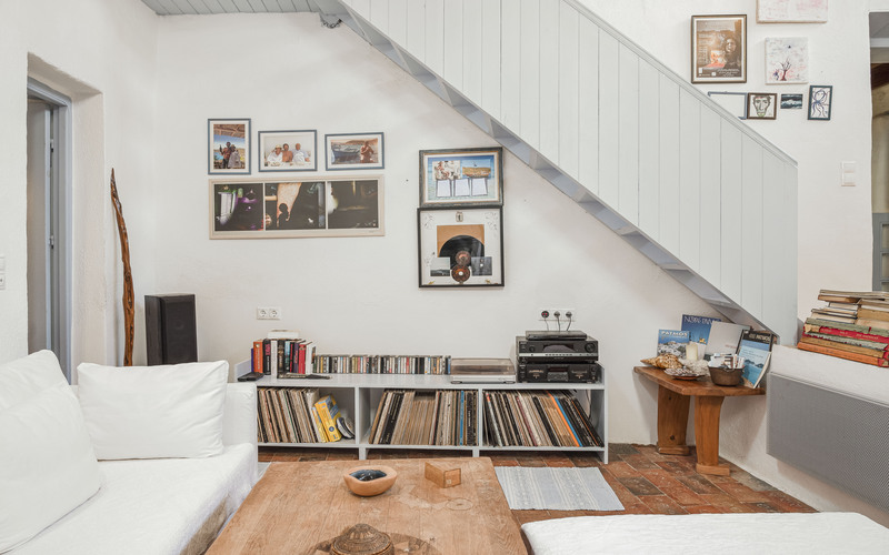 living area and stairs to upper floor
