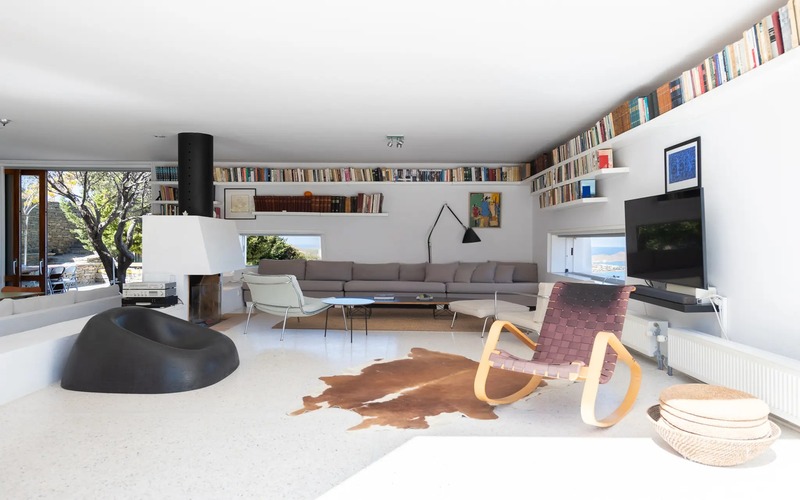 living area with tv and large sofa