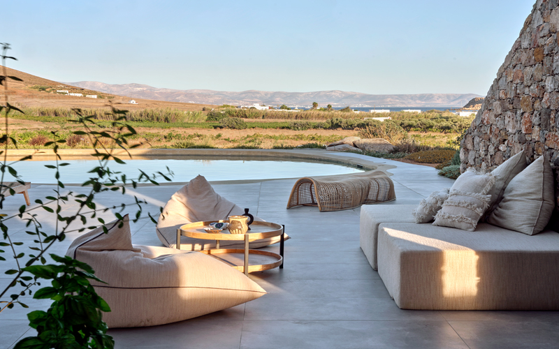 outdoor lounge area with sunset view