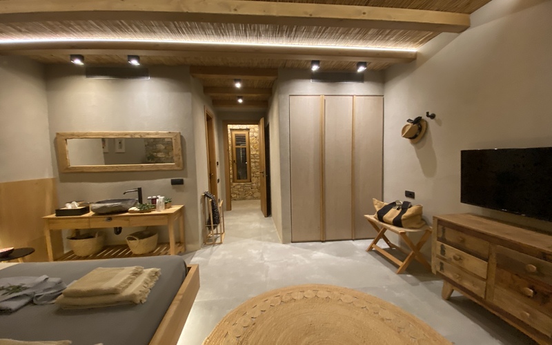 bedroom with double bed and TV