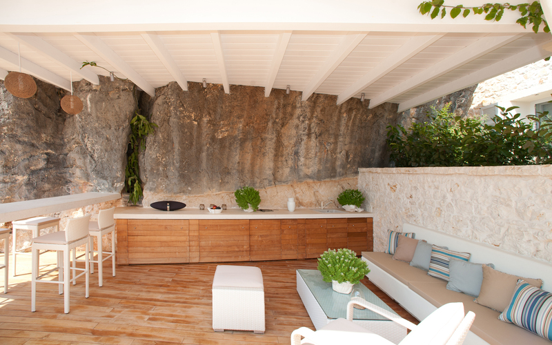 shaded lounge area on a wooden deck