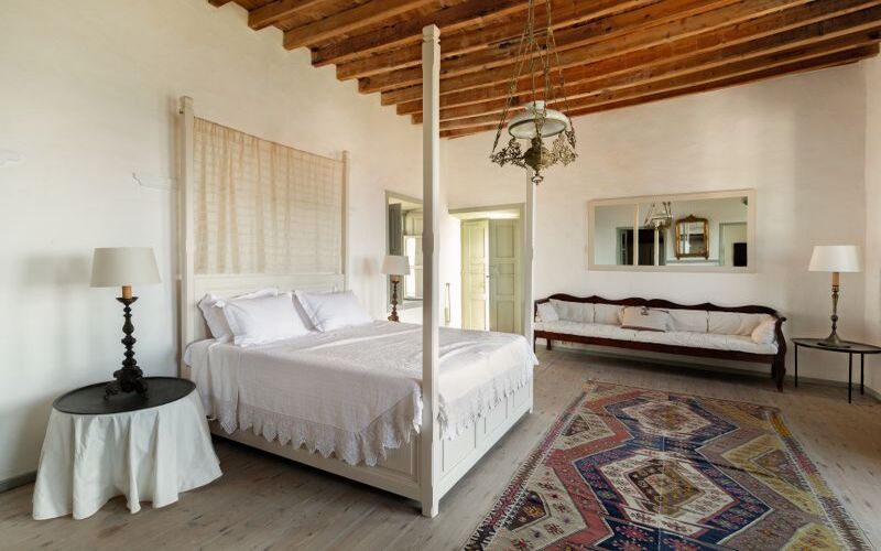double bedroom with sofa