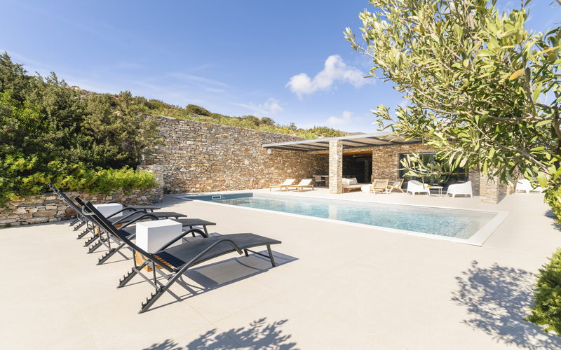 pool area with sunbeds