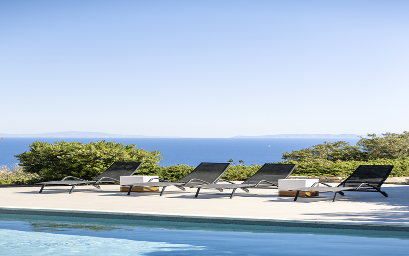 pool area with sunbeds