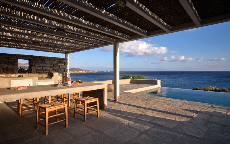 outdoor dining area with sea view