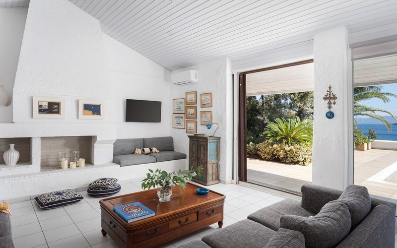 living area with fire palce and sea view