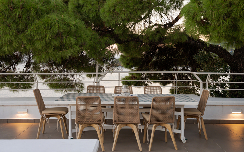 outdoor dining area with sea view