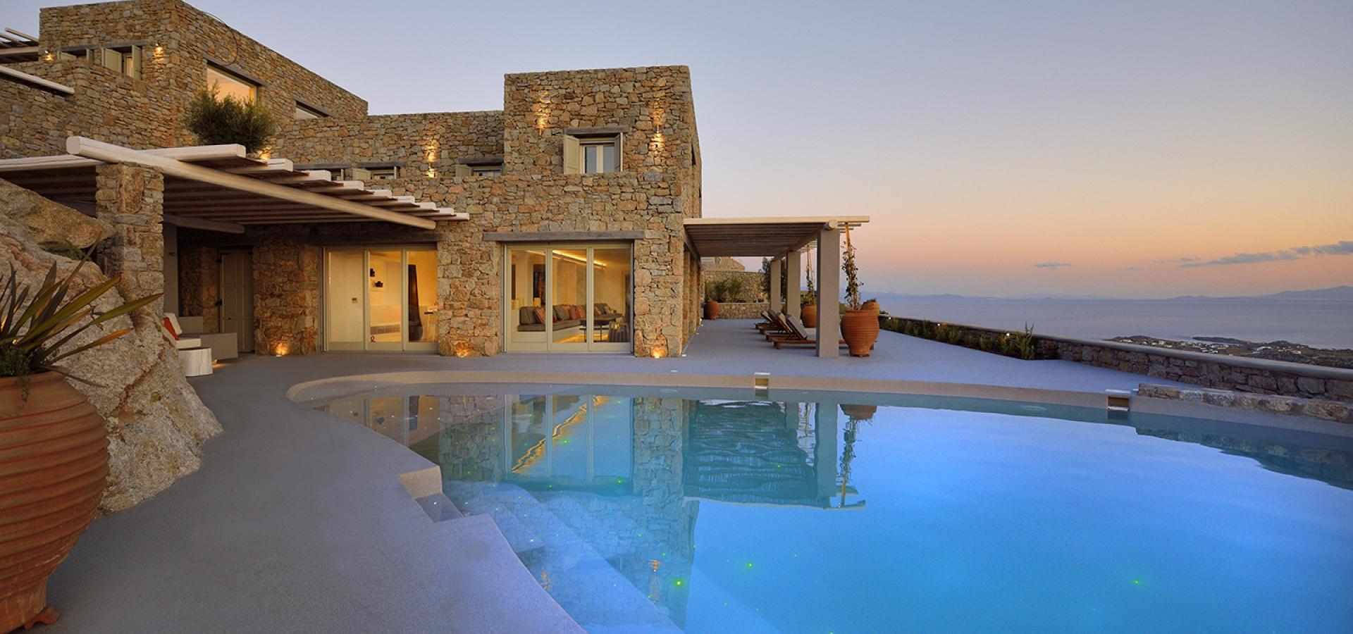 villa and pool area at sunset